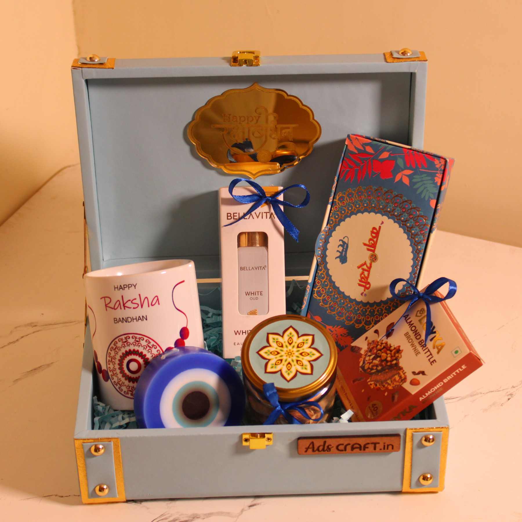 Luxury Rakhi Gift Hamper for Him – Blue Trunk Box with Mug, Perfume, Premium Rakhi & Scented Candle