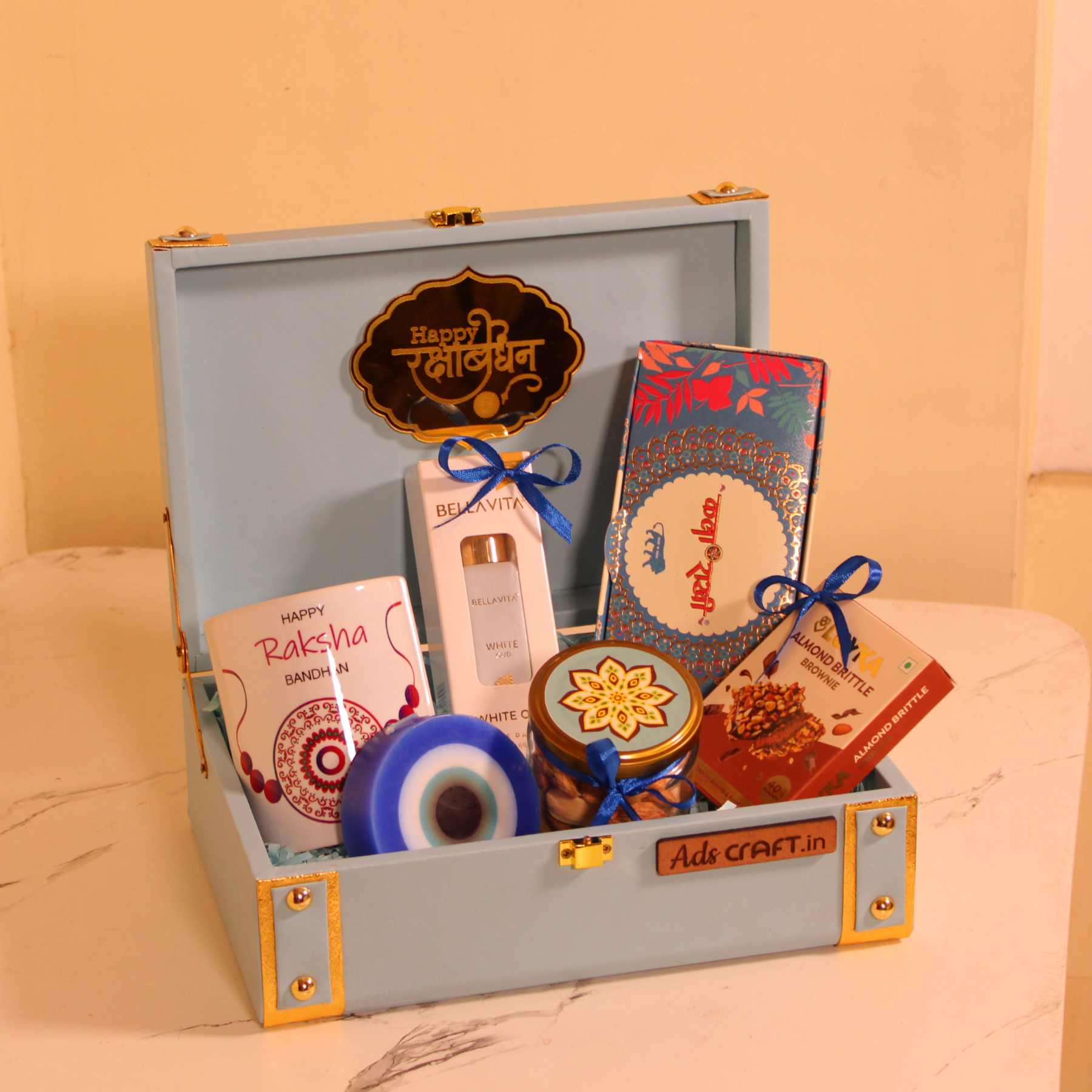 Luxury Rakhi Gift Hamper for Him – Blue Trunk Box with Mug, Perfume, Premium Rakhi & Scented Candle