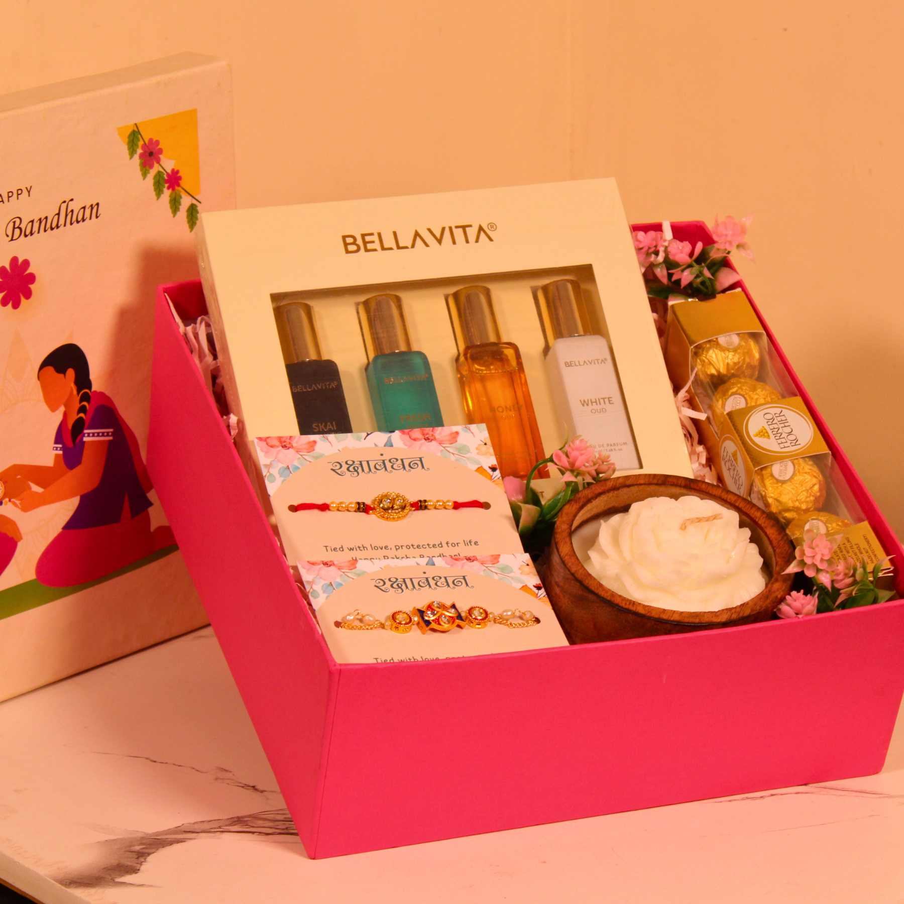 Rakhi Gift Hamper for Bhaiya Bhabhi – Pink Box with Couple Rakhi, Perfume Set, Chocolates & Candle