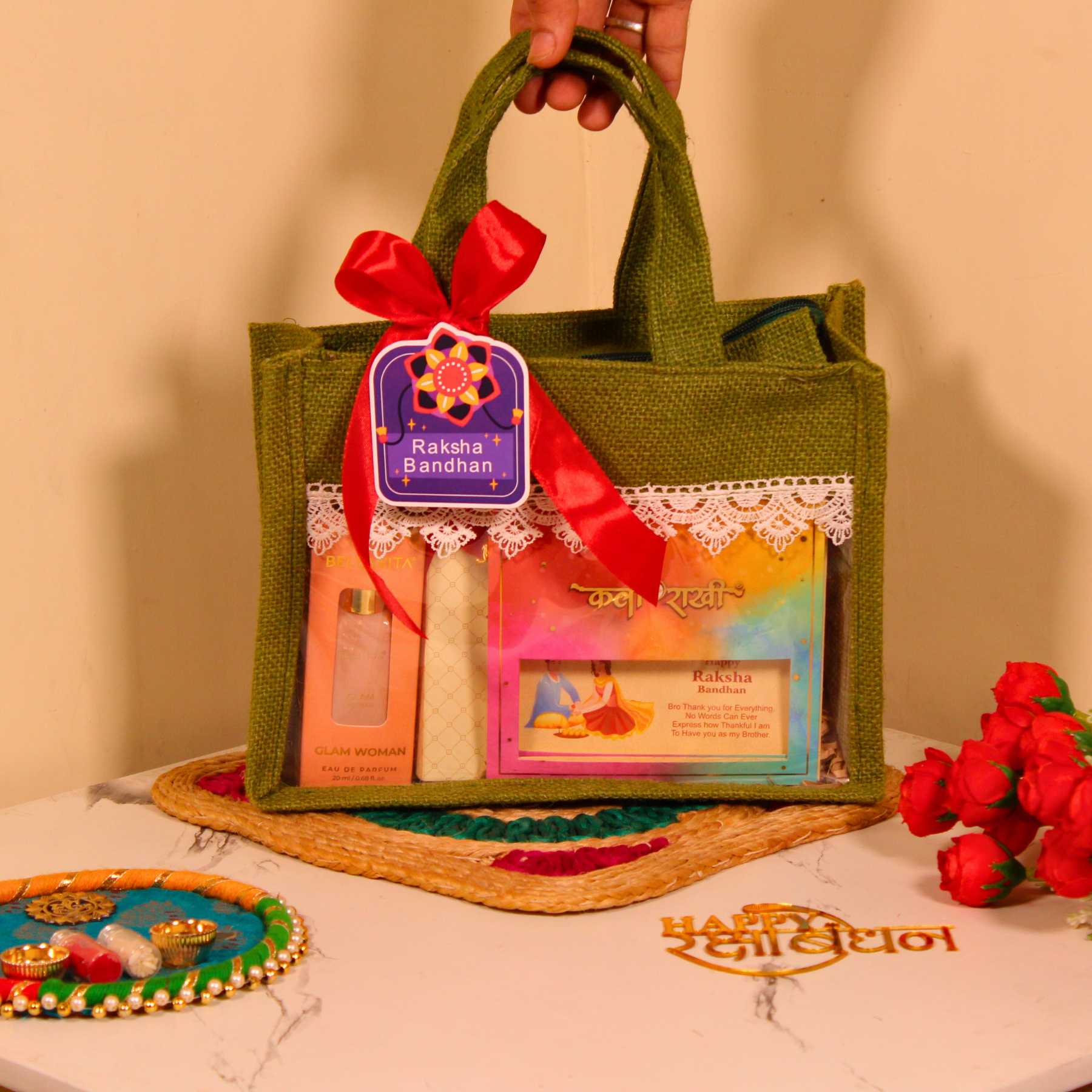 Rakhi Gift Hamper for Brother – Olive Green Jute Bag with Dry Fruits, Perfume, Rakhi & Chocolates