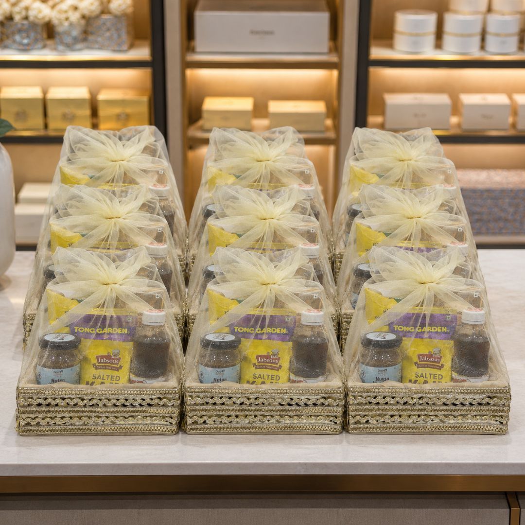 Cream organza potli basket suitable for Diwali corporate hampers and festive gifting