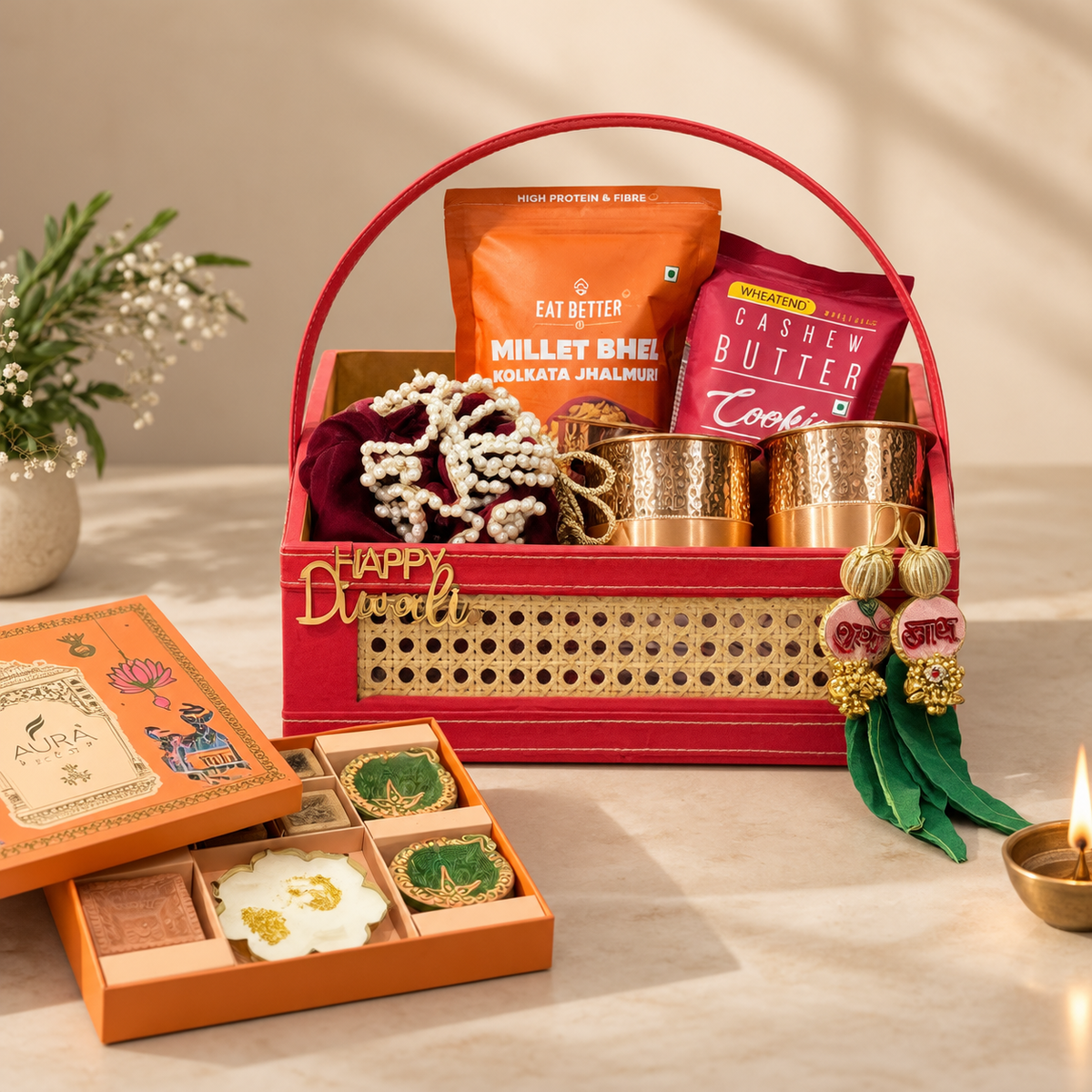 Royal Copper Luxe Diwali hamper with cashews, almonds, copper glass set, cookies, candle and festive decor