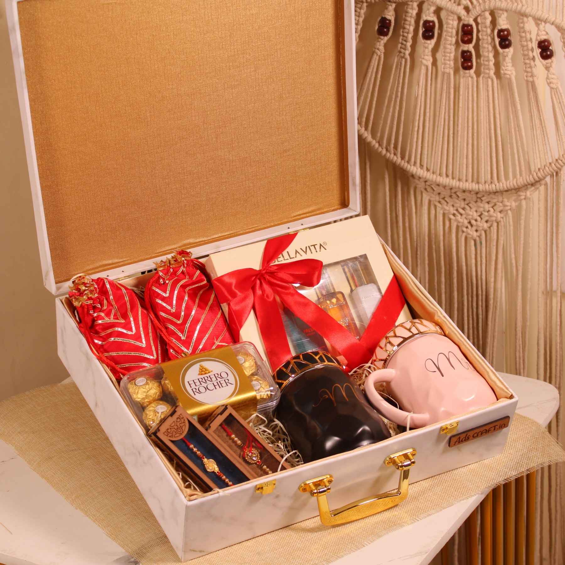 Regal Rakhi Gift Box – Couple Mugs, Perfume Set & Chocolates in Marble Finish Suitcase