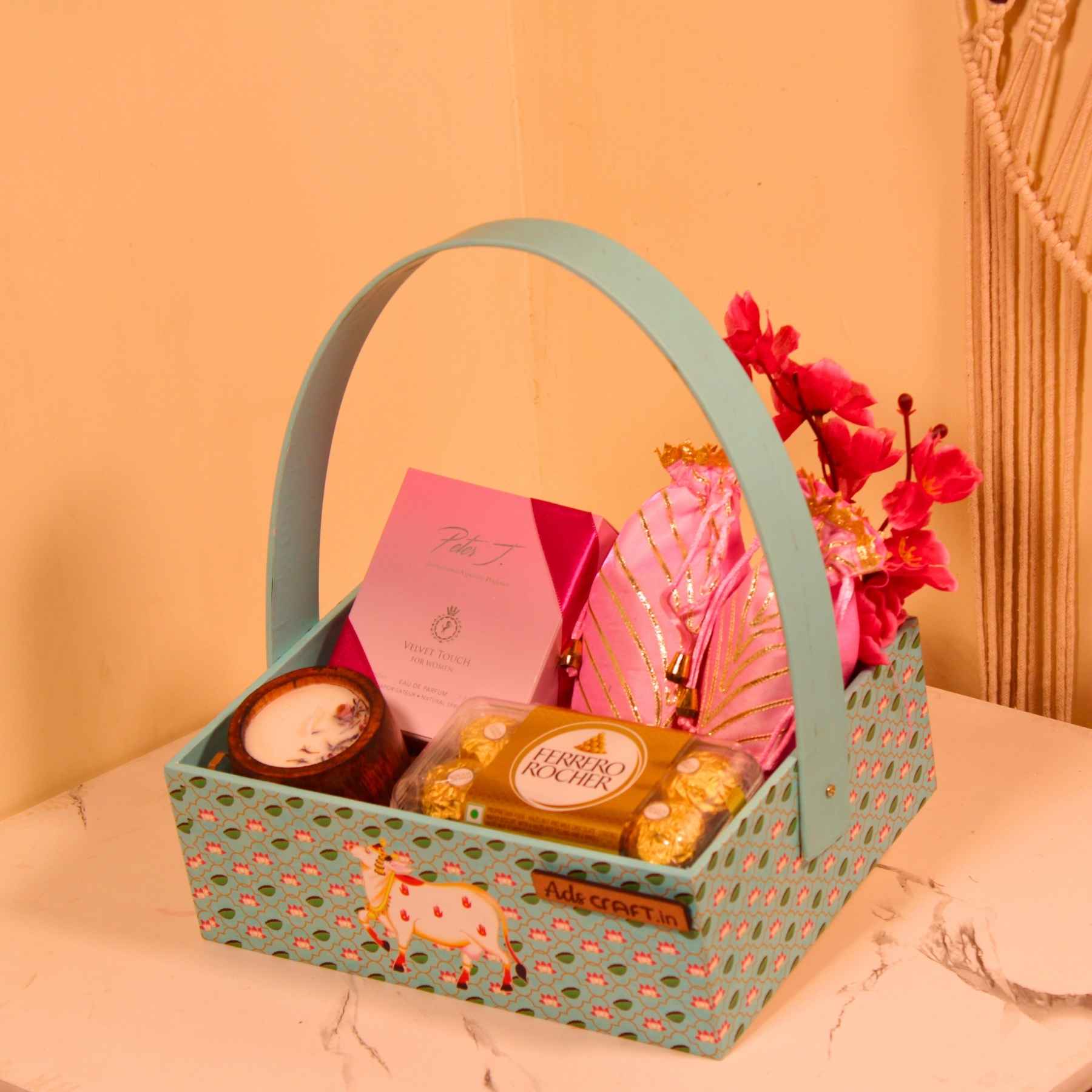 Pastel Glow Rakhi Hamper – Perfume, Chocolates & Potli Treats in Designer Basket