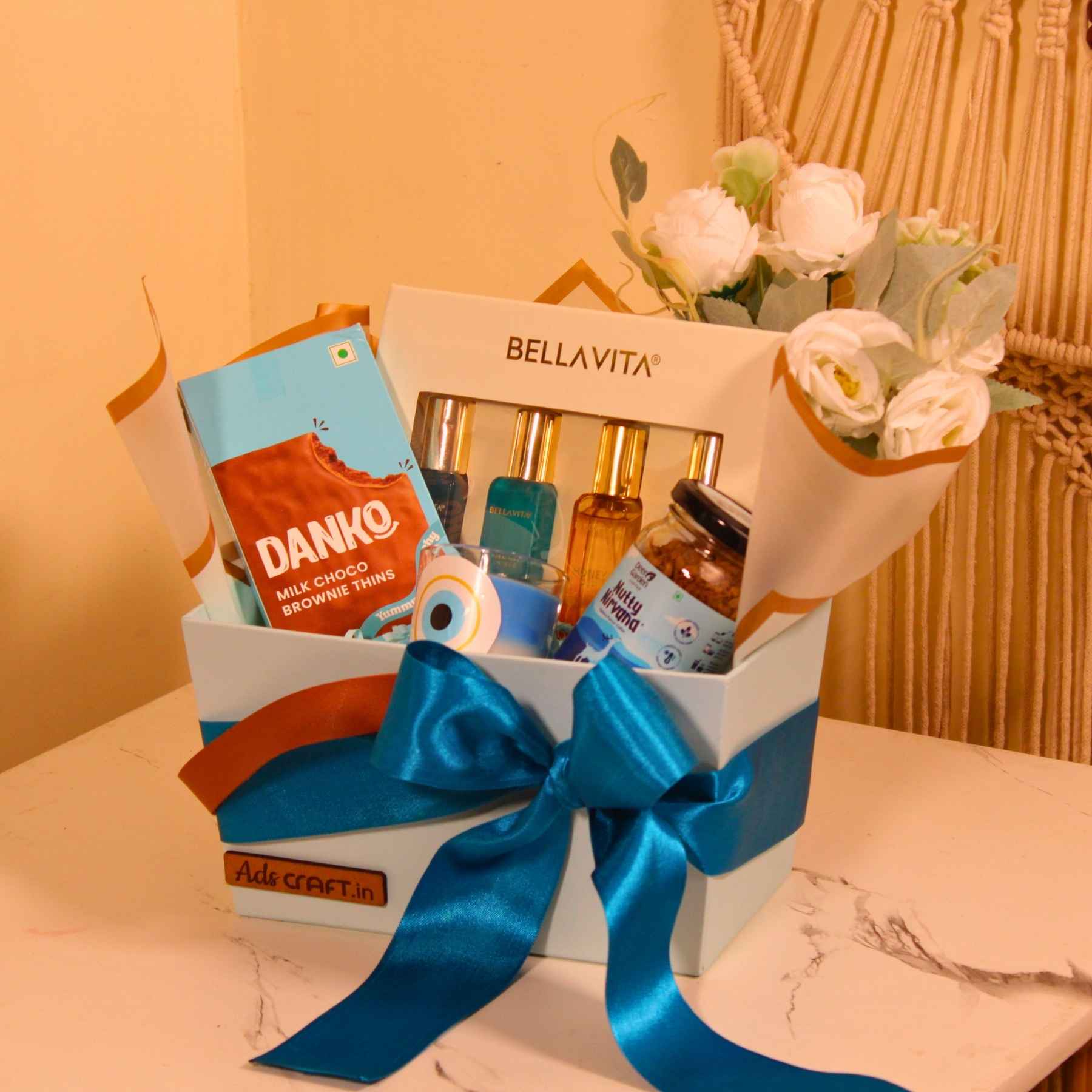 Stylish Blue Ribbon Gift Hamper with Perfume, Chocolate & Coffee – Ideal for All CelebrationsStylish Blue Ribbon Gift Hamper with Perfume, Chocolate & Coffee – Ideal for All Celebrations