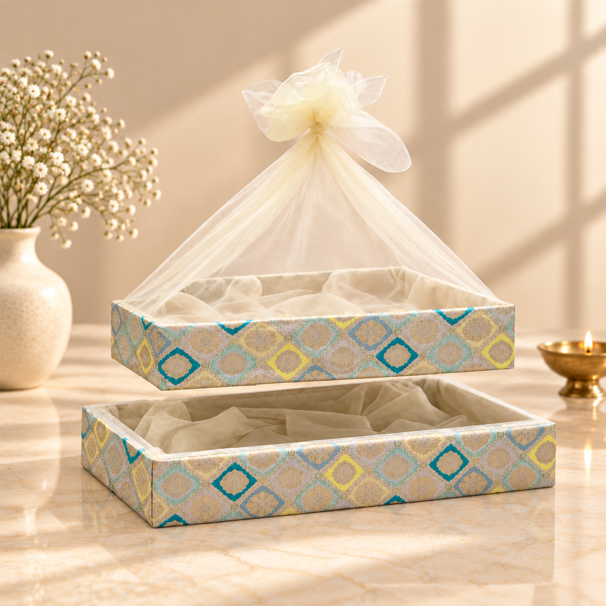 Traditional Blue and Gold Brocade large nesting tray set of 2 with geometric pattern and ivory sheer net cover for gifting in India