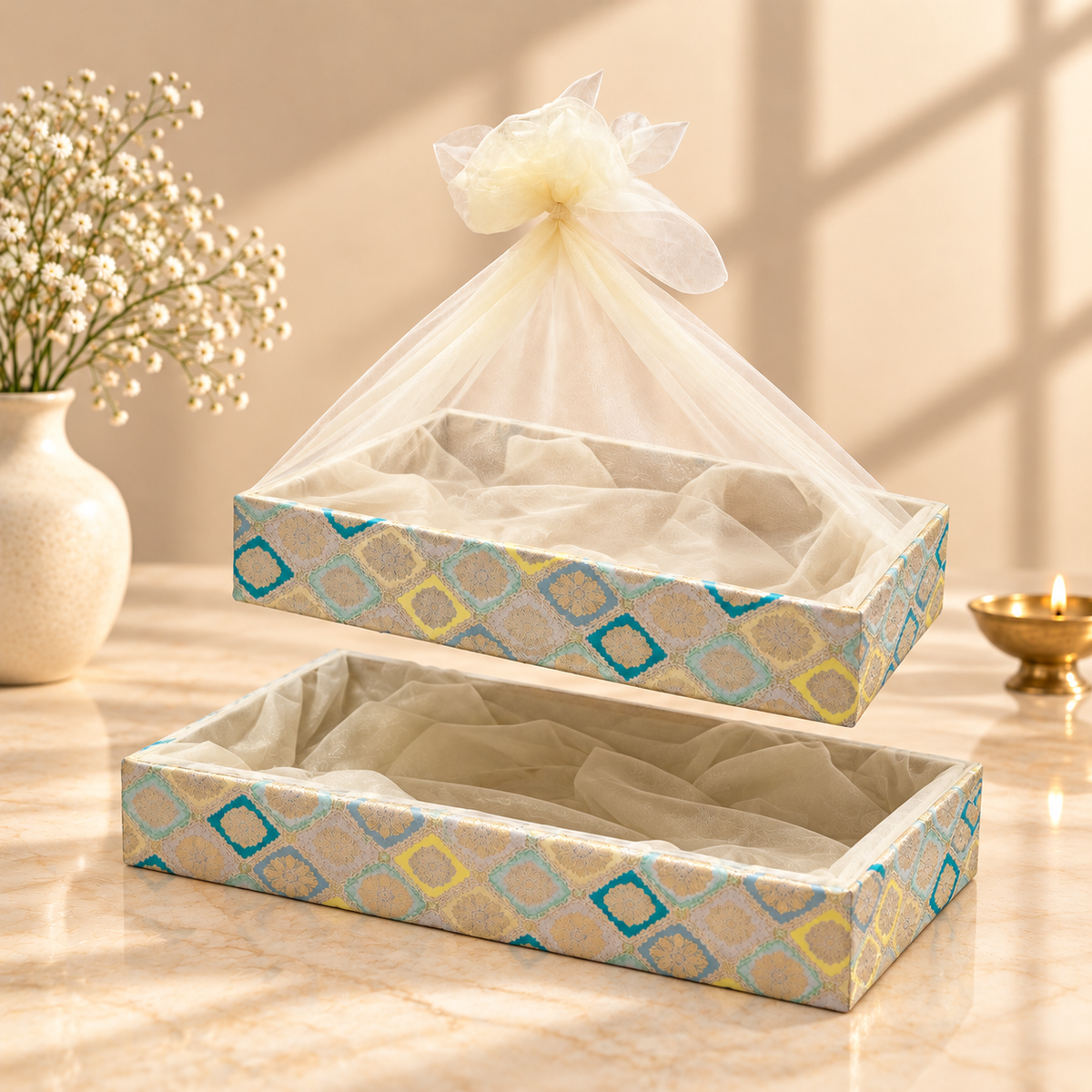 Blue and Gold Brocade nesting tray set of 2 in 18x12 and 21x15 inch sizes with ivory sheer net cover
