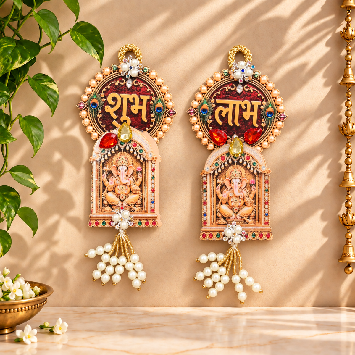 Traditional Ganesha Shubh Labh latkans with gemstones and pearls displayed on main door for Diwali decoration